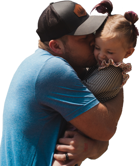 Foto de un padre abrazando a su hija